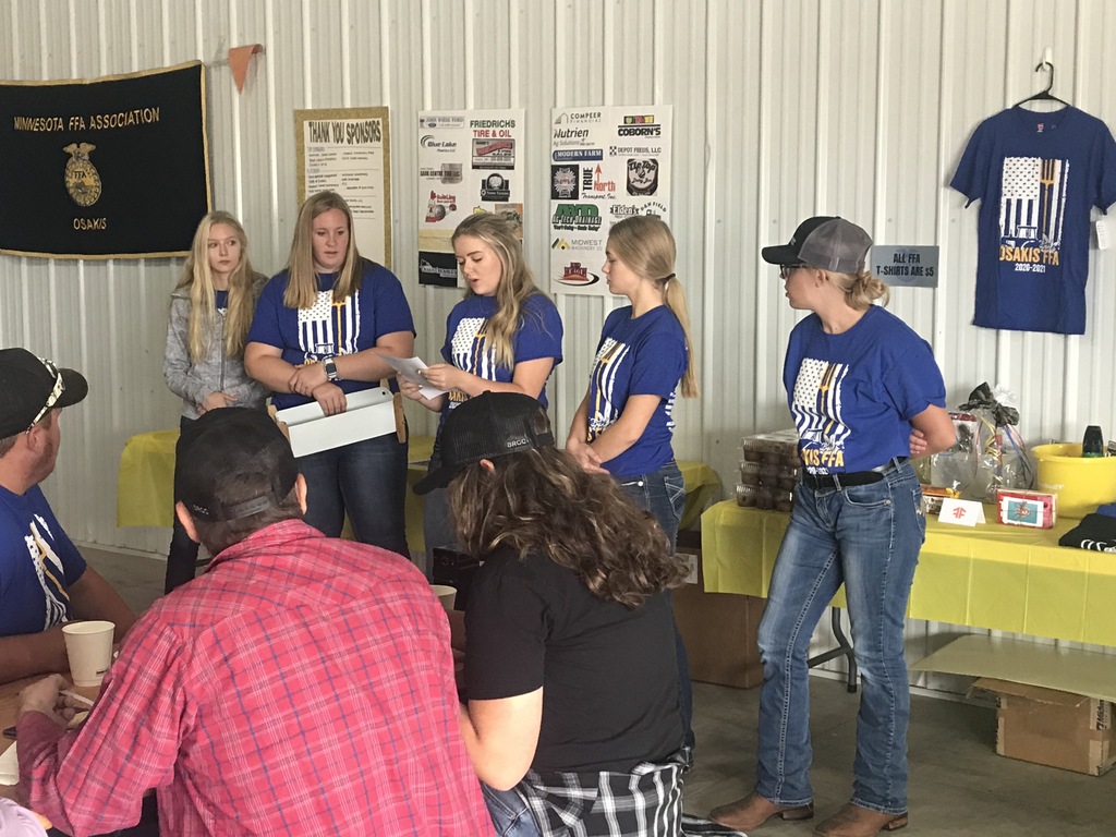 Eva Moore drawing door prizes for FFA Tractor Day